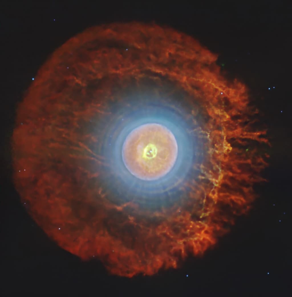 Planetární mlhovina s vesmírnými koulemi Buckyballs