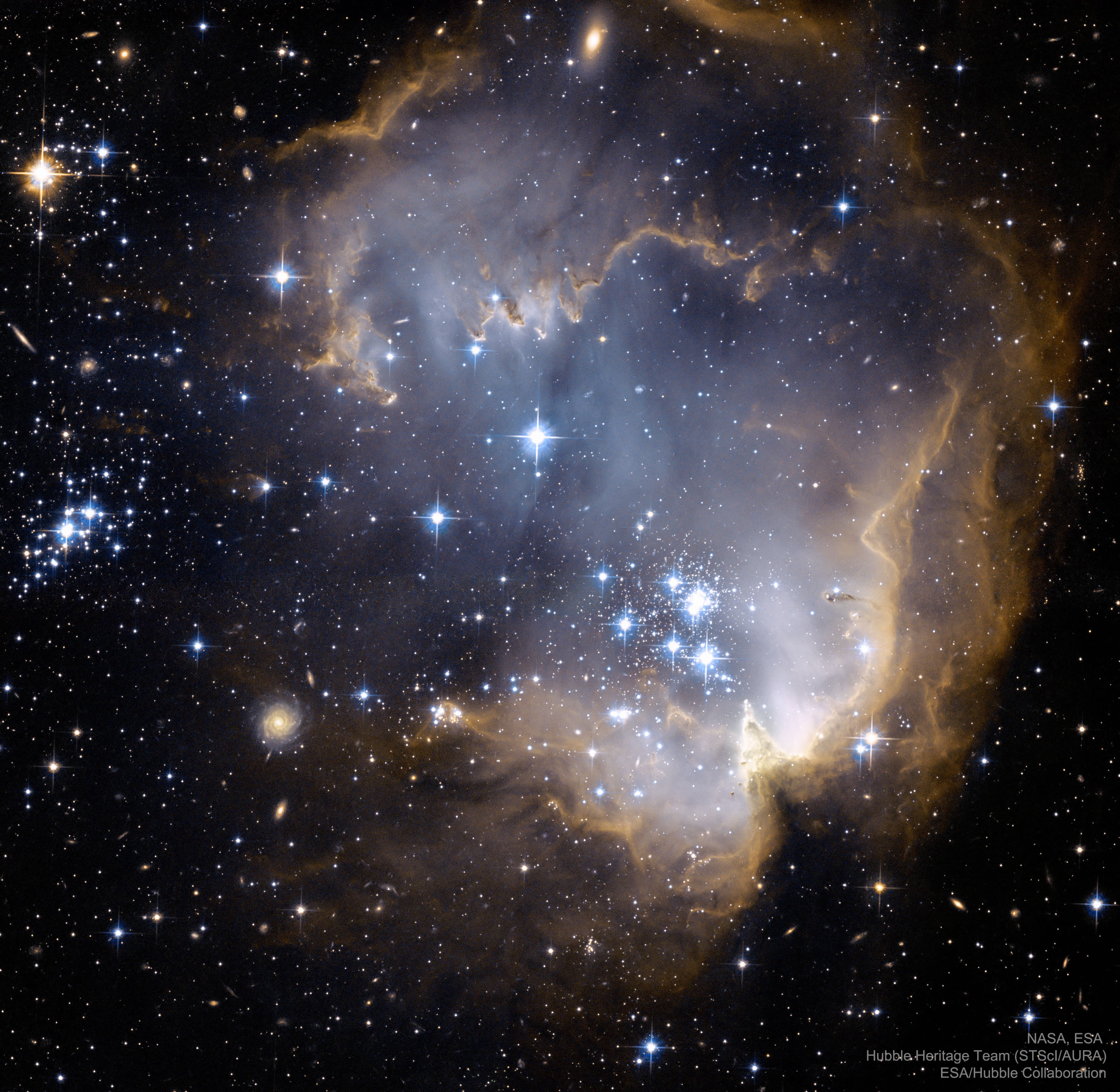 NASA obrázek dne: NGC 602 a další